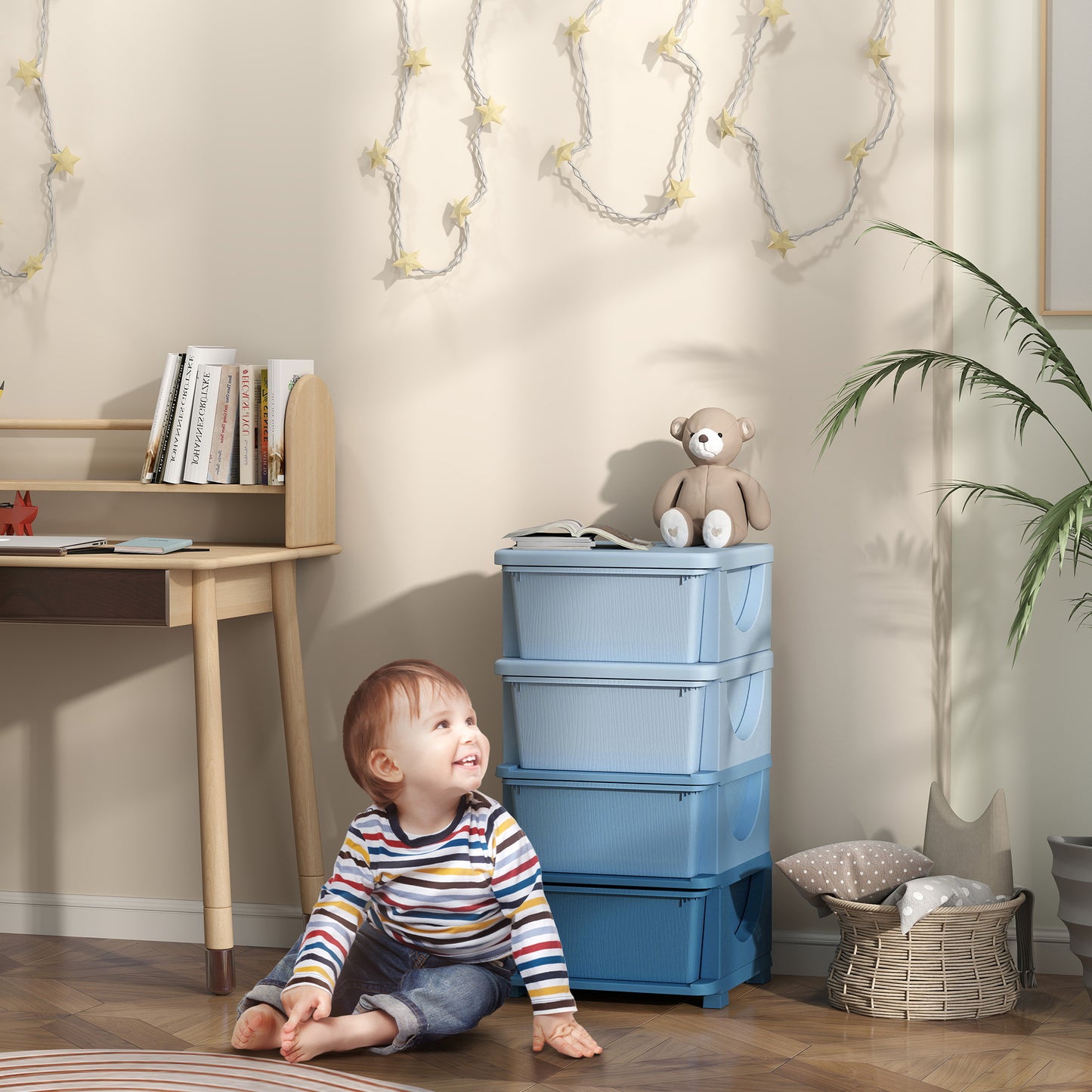 Child sitting on the floor next to a stack of blue storage boxes in a room with a desk and teddy bear.
